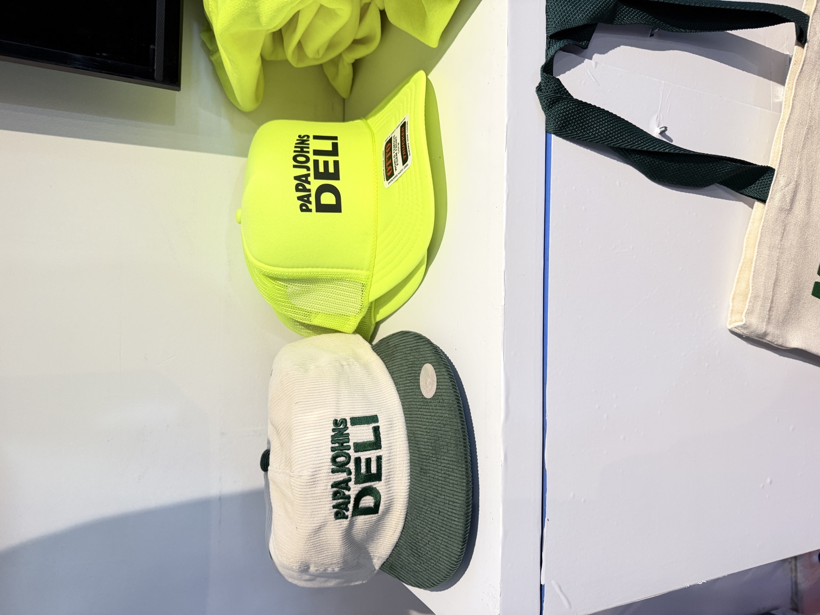 Finished shirts, hats, patches, and event merch for Live T-Shirts Printing